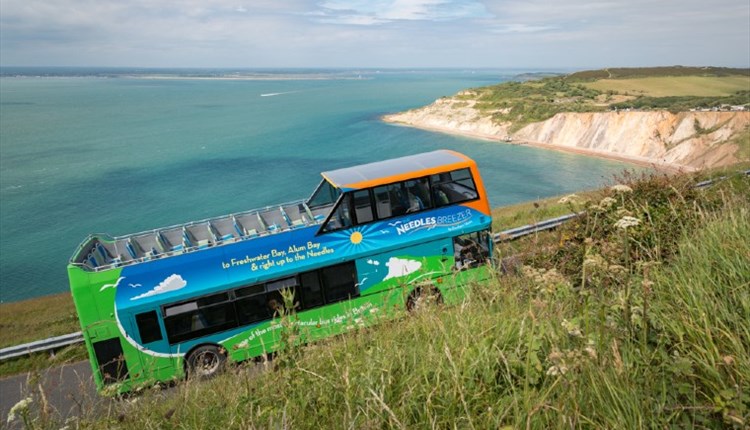 Breezer bus driving along the coast